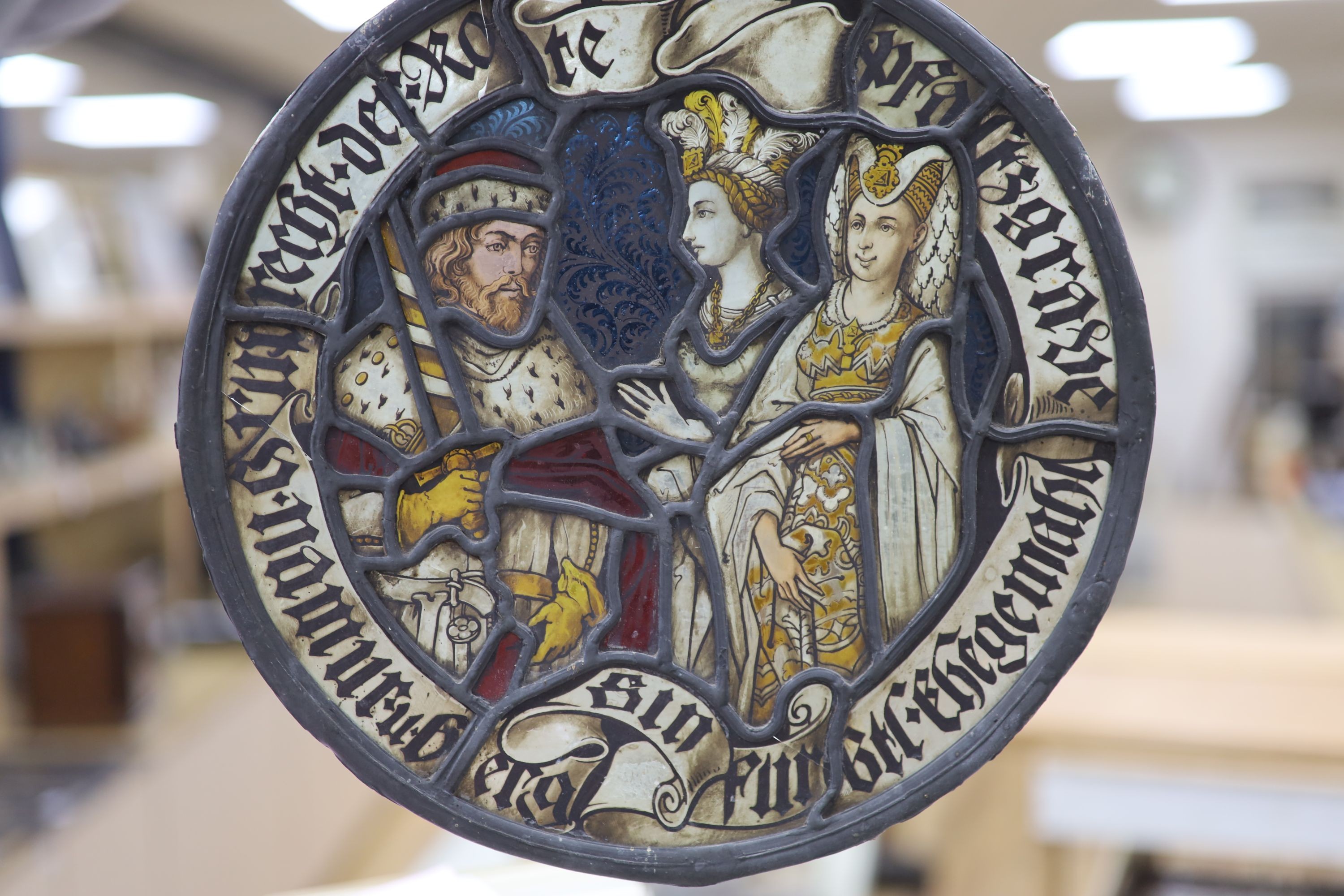 A 19th century German oval leaded and stained glass panel, in the 16th century style, 30cm